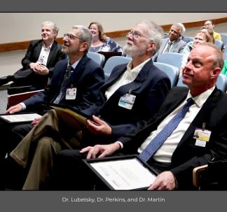 Drs. Lubetsky, Perkins and Martin are recognized by Department Chair Dr. David Lewis
